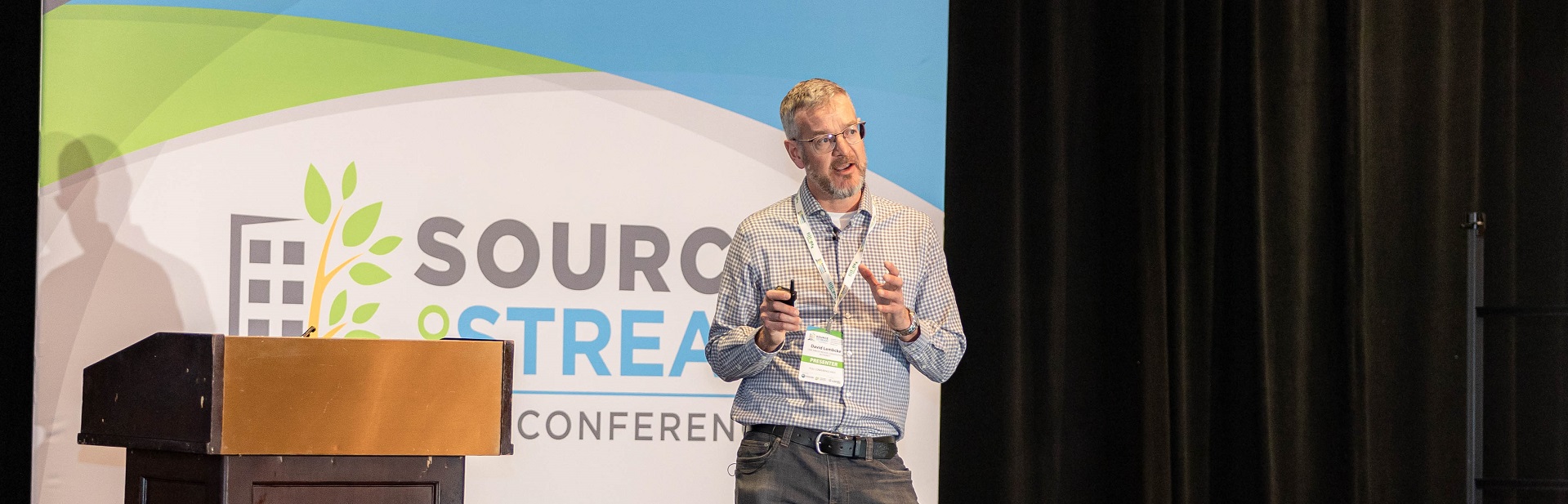 presenter delivers talk at 2024 Source to Stream Conference