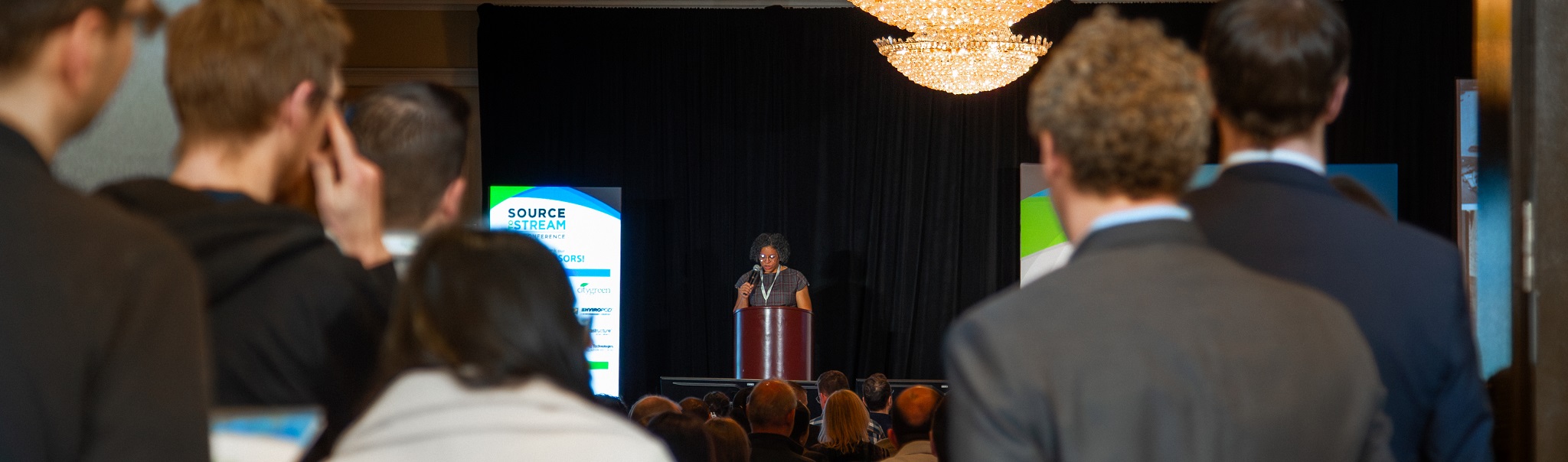 Source to Stream delegates gather to listen to a keynote presentation