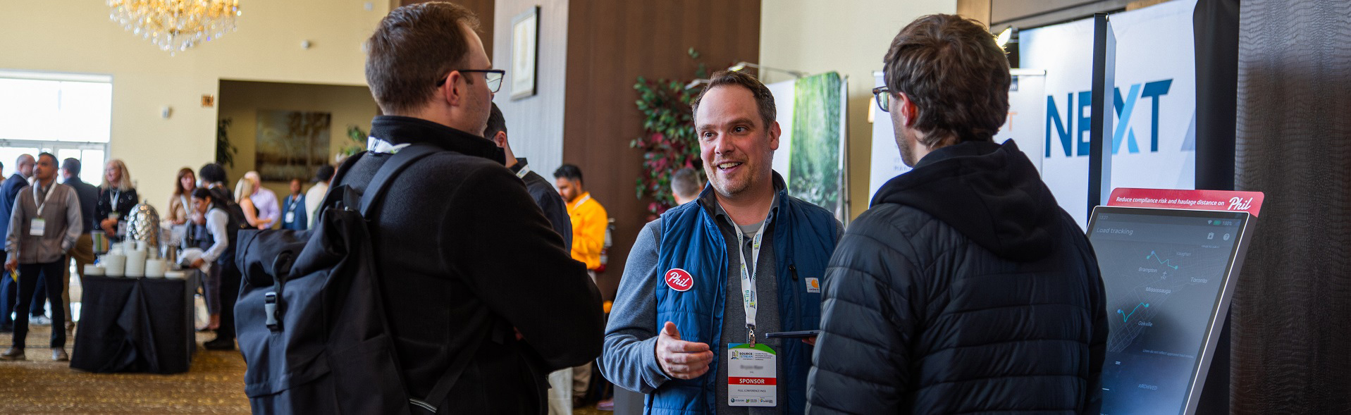 a corporate sponsor networks with delegates at the Source to Stream conference