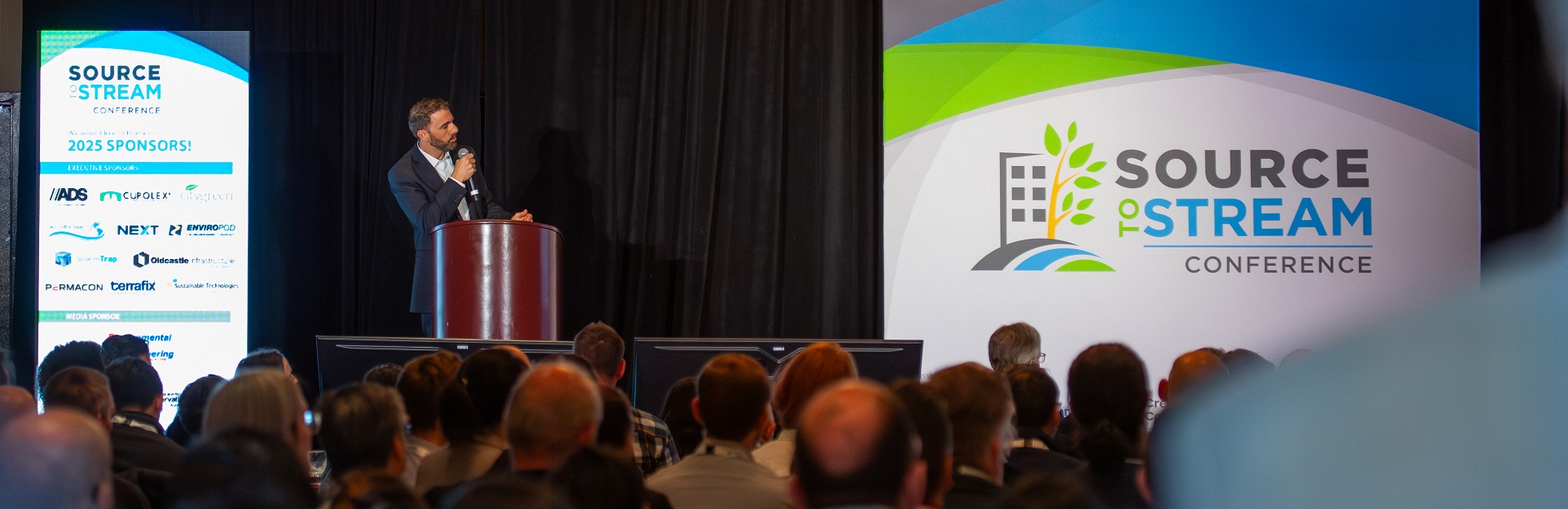 a speaker delivers a presentation at the Source to Stream Conference